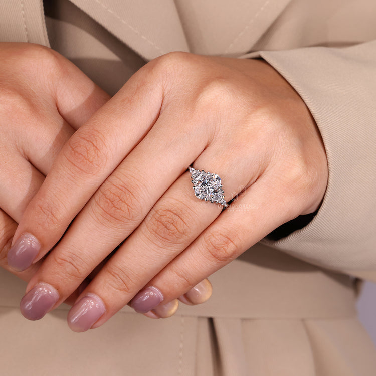 Handmade jewelry featuring muse setting and cluster diamond accents.
