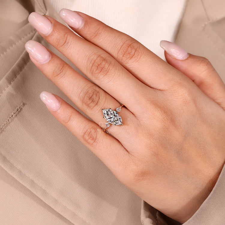 Custom diamond ring with three stone design.
