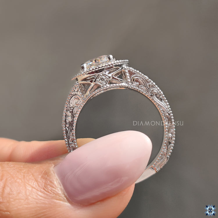 Vintage halo ring with a brilliant moissanite stone in the center for added sparkle.
