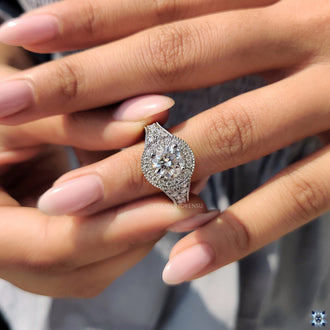 Vintage milgrain engagement ring showcasing a timeless design with intricate detailing.
