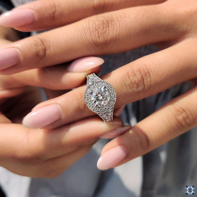 Vintage milgrain engagement ring showcasing a timeless design with intricate detailing.
