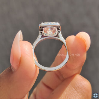 White gold engagement ring with radiant cut moissanite for a luxurious touch.
