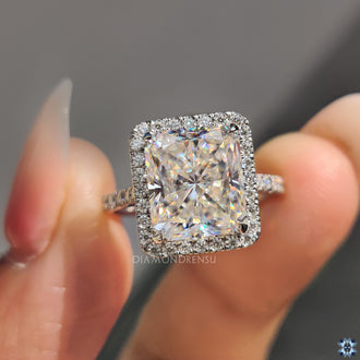 Pave ring with radiant cut moissanite for a sophisticated sparkle.
