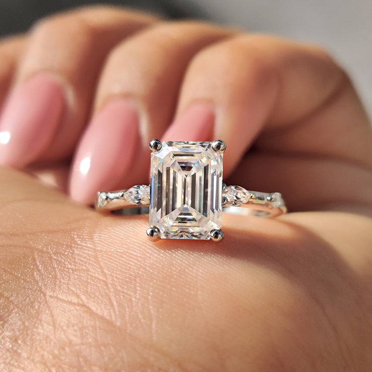 Emerald cut moissanite ring featuring a stunning emerald cut emerald design.
