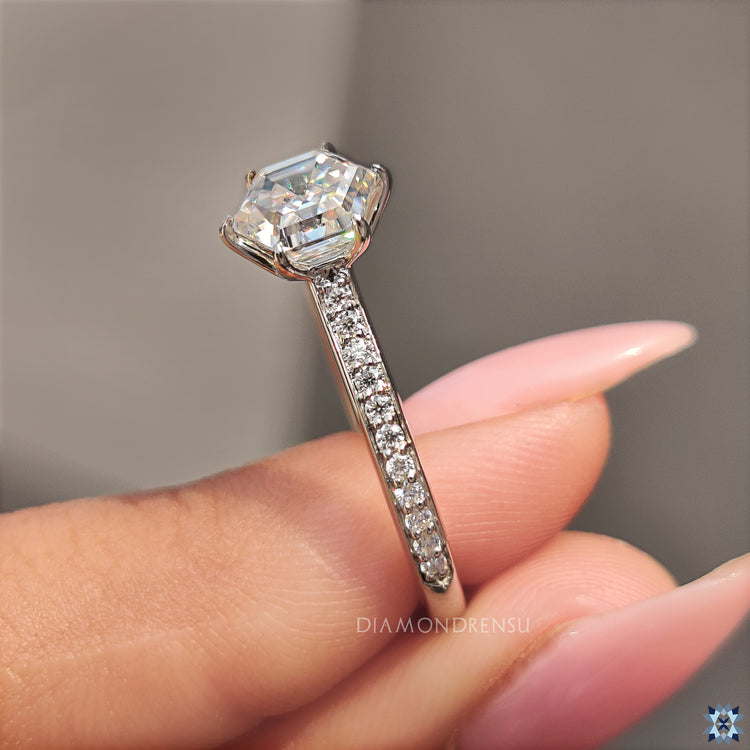 Hexagon engagement ring with a round cut  moissanite for a modern twist.
