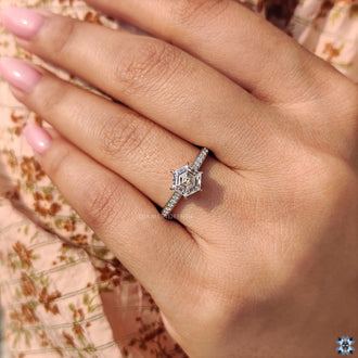 Handmade ring featuring a hexagon  moissanite center for a unique design.

