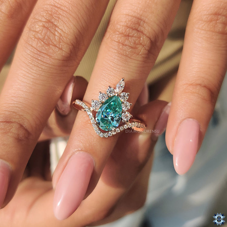 Diamondrensu ring with pear cut cyan blue moissanite

