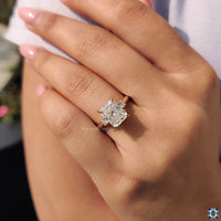 Hidden halo radiant engagement ring with flawless detailing.
