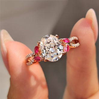 Oval moissanite engagement ring in twisted pave design.
