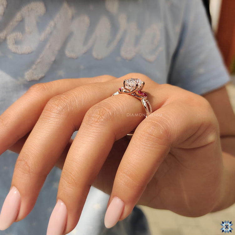 Diamondrensu engagement ring with rose gold setting.
