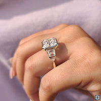 Yellow gold ring with asscher cut stone for a timeless, classic style.
