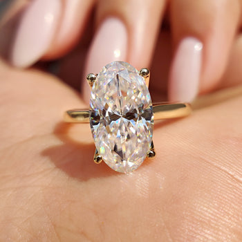 moval engagement ring in yellow gold
