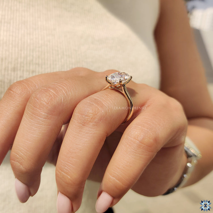 handmade jewelry featuring moval solitaire ring
