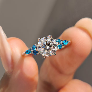 Round moissanite engagement ring seven stone ring muse ring.
