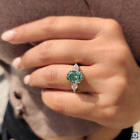 Diamondrensu engagement ring round prong three stone oval ring.
