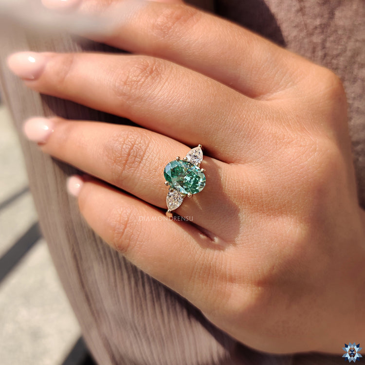 Yellow gold ring round prong diamondrensu engagement ring.
