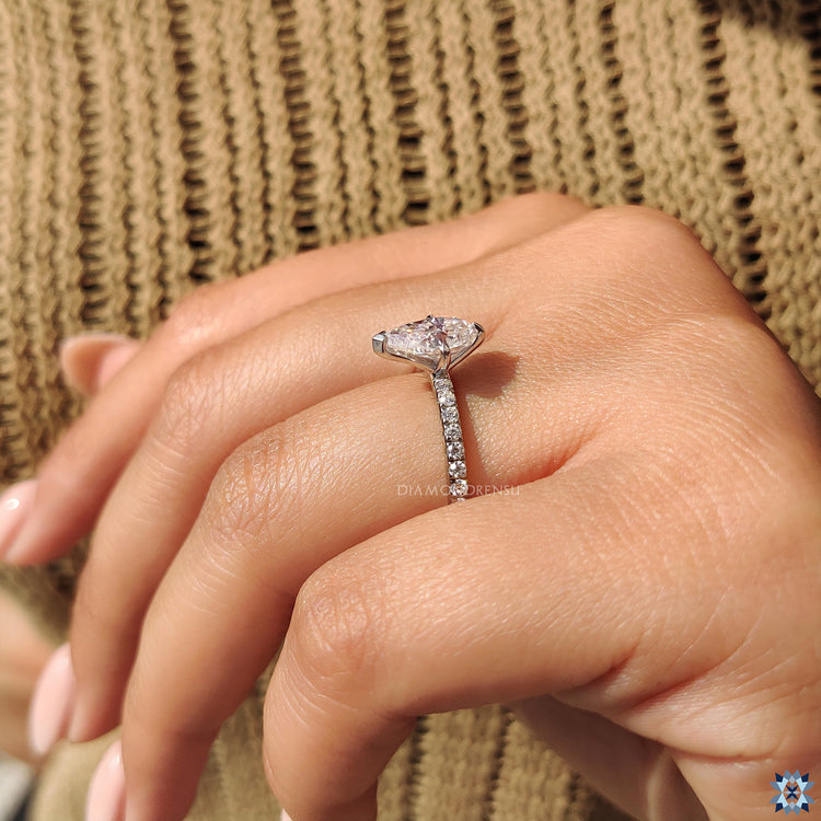 Moissanite Engagement Ring featuring pear-shaped moissanite.
