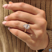 Cathedral Setting Ring elevating the beauty of the center stone.
