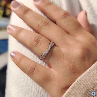 Half eternity wedding band with baguette diamonds.
