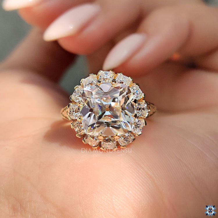 Cushion old mine cut moissanite ring.
