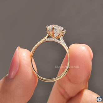 Moissanite engagement ring in a vintage-inspired design.
