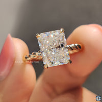 Round cut hidden halo engagement ring design.
