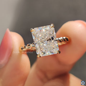 Round cut hidden halo engagement ring design.
