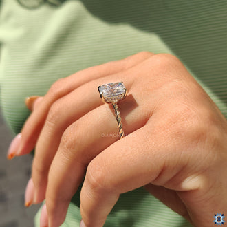 Yellow gold moissanite ring in modern style.
