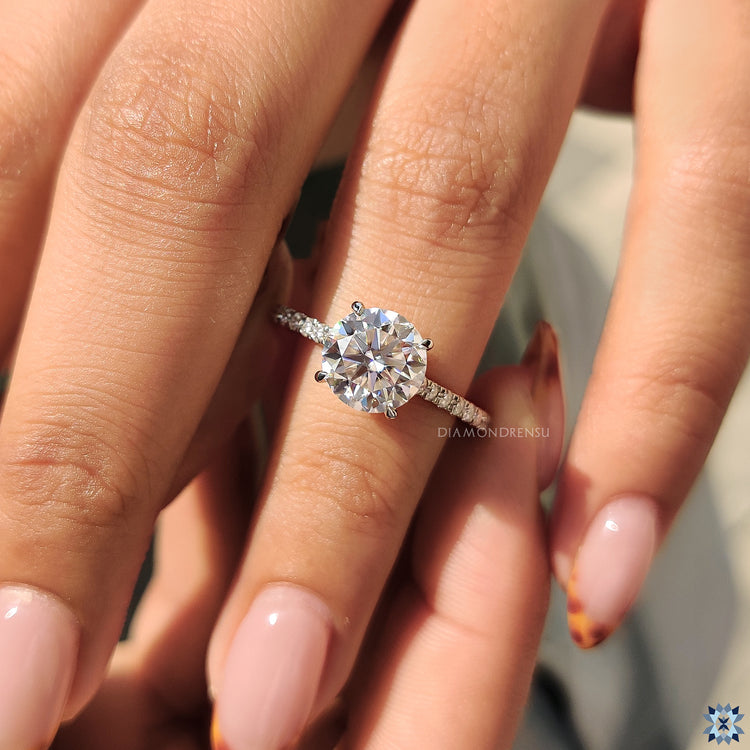 Round cut moissanite ring with a clean, radiant finish.
