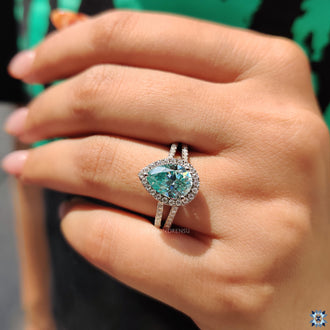 Moissanite halo ring designed with split pave diamonds for added detail.
