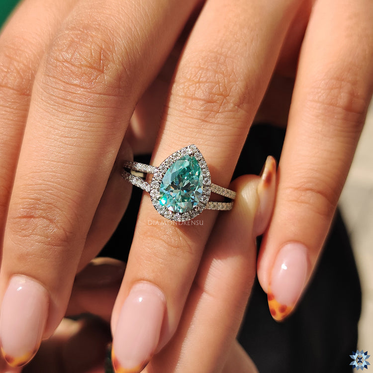 Handmade jewelry crafted to highlight pear and halo styles.
