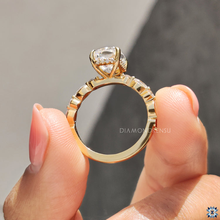 Four prong setting with clean lines and open view.
