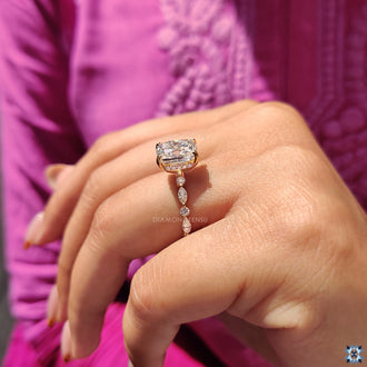 Round cut hidden halo setting enhances brilliance.
