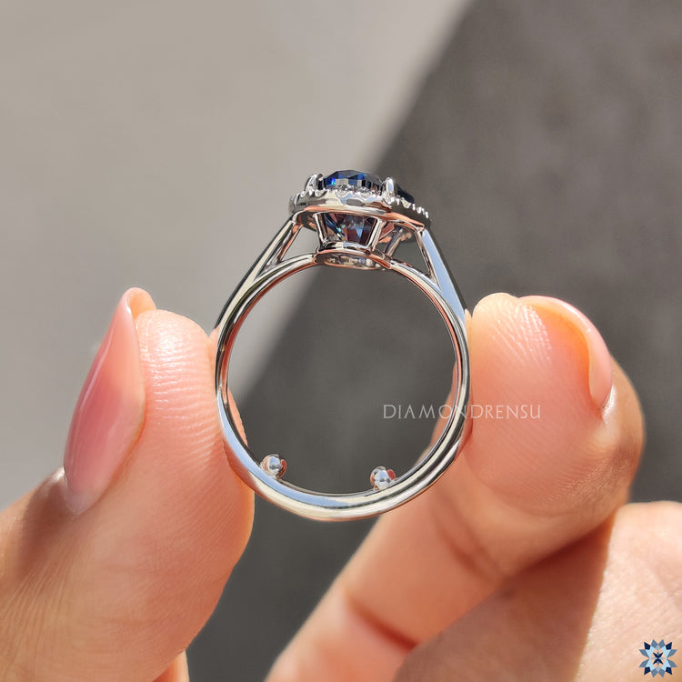 A white gold engagement ring offers a sleek, polished finish.
