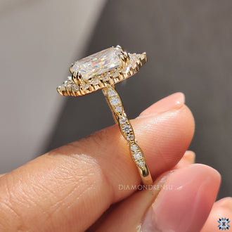 Filigree ring with detailed accents surrounding a radiant cut stone.