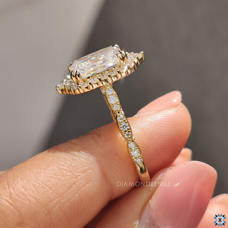 Filigree ring with detailed accents surrounding a radiant cut stone.