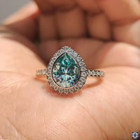 Moissanite Engagement Ring in a unique halo ring setting, handmade.
