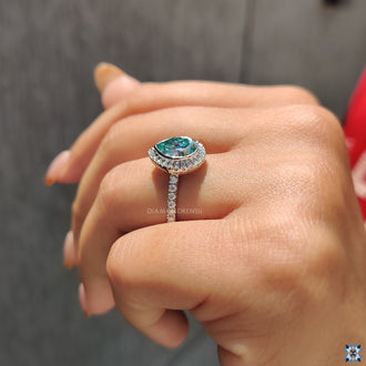 Bezel Set Engagement Ring featuring round cut Moissanite, handmade jewelry.
