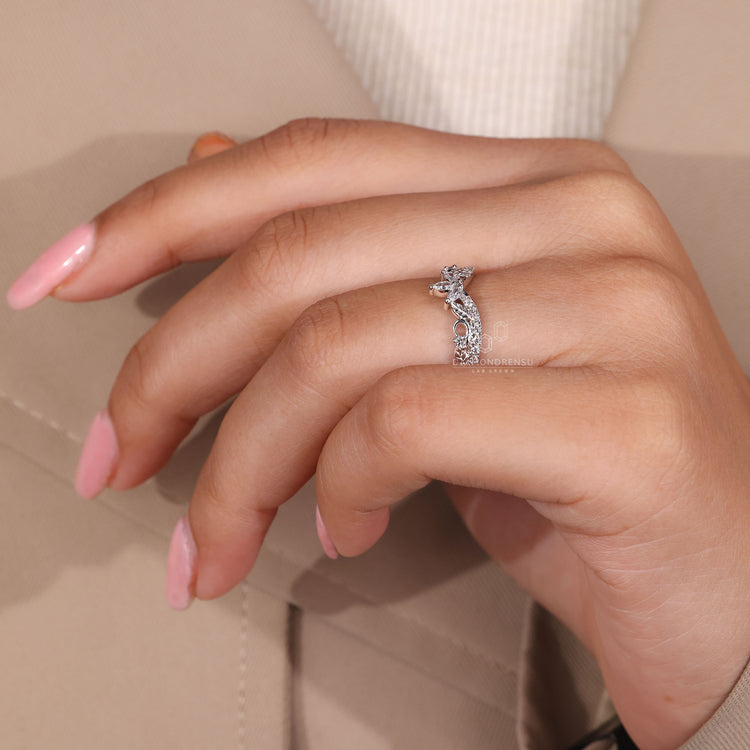 Art deco wedding band with marquise diamonds in white gold setting.
