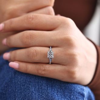 Pave setting ring with 4 prong setting in white gold.
