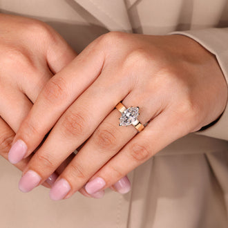 Two v shaped prong ring holding Old European cut diamond securely.
