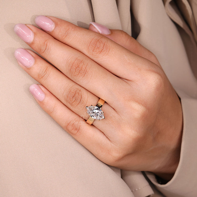 Diamondrensu engagement ring featuring Old European cut diamond and yellow gold.
