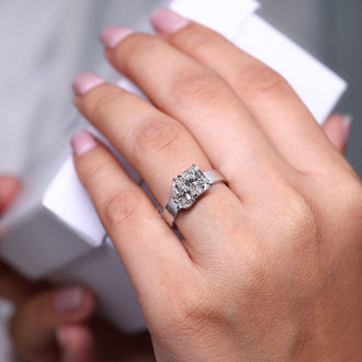 Two stone ring with Toi et Moi diamonds in claw prong setting.
