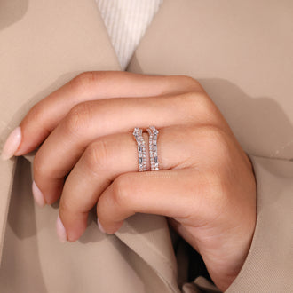 Baguette and Round Cut Diamond combination in a custom rose gold wedding band.
