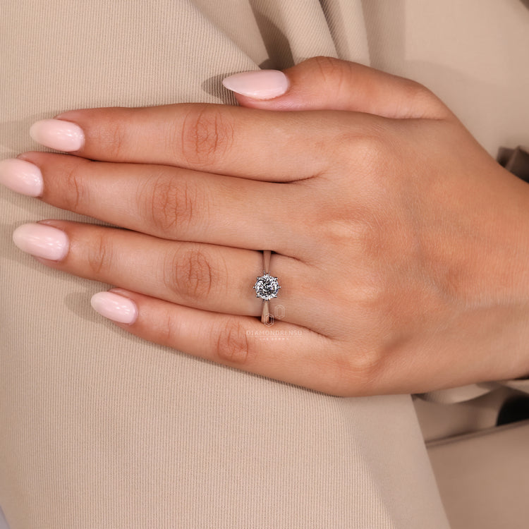 IGI certified diamond in a white gold cathedral setting ring.
