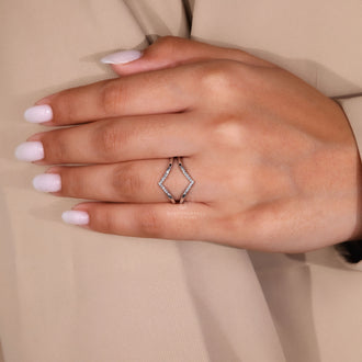 Handmade jewelry featuring a custom ring enhancer band.
