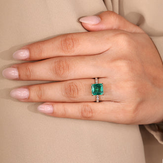 Diamondrensu asscher cut emerald engagement ring.
