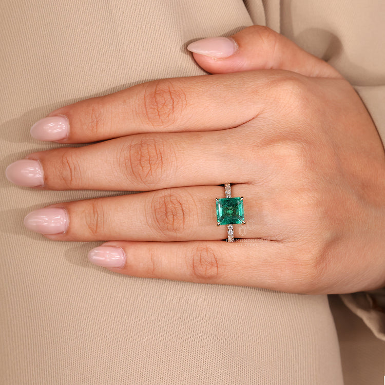 Diamondrensu asscher cut emerald engagement ring.
