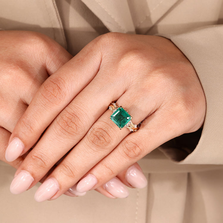 Handmade emerald gemstone engagement ring.
