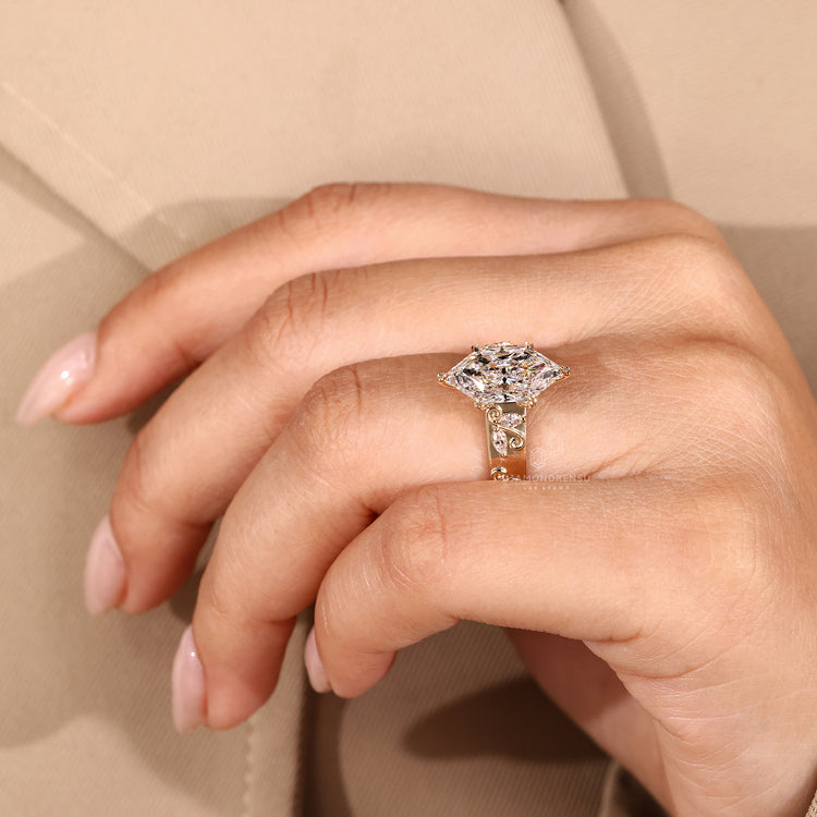 IGI certified engagement ring showcasing a Dutch marquise diamond center.
